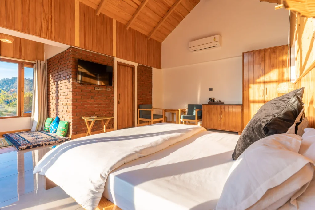 The signature Ethnic Trail Room showcasing authentic Dharchula wooden heritage in Naukuchiatal.